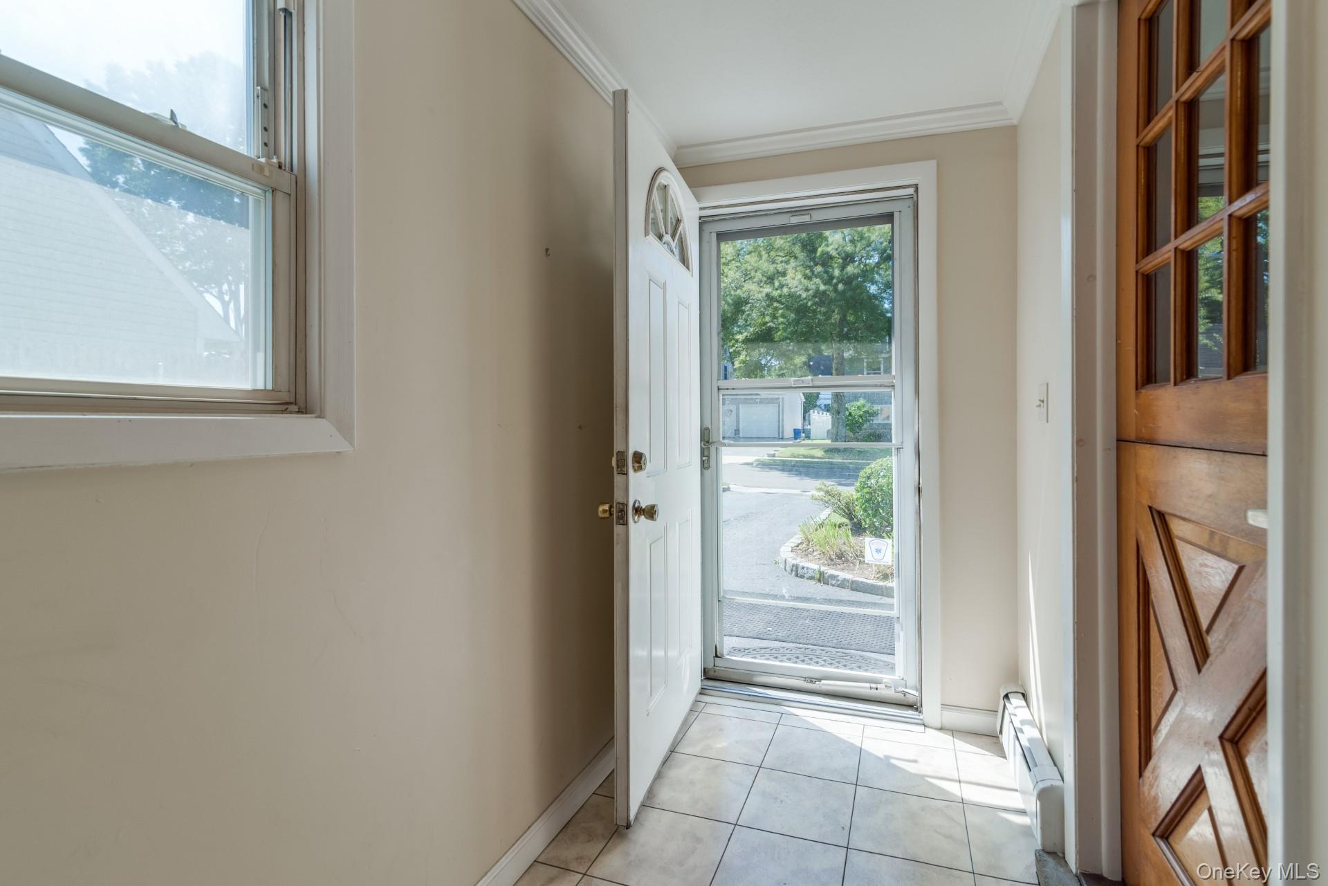 27 Collins Road Glen Cove, NY 11542 - Photo 4 of 13 a view of an entryway door