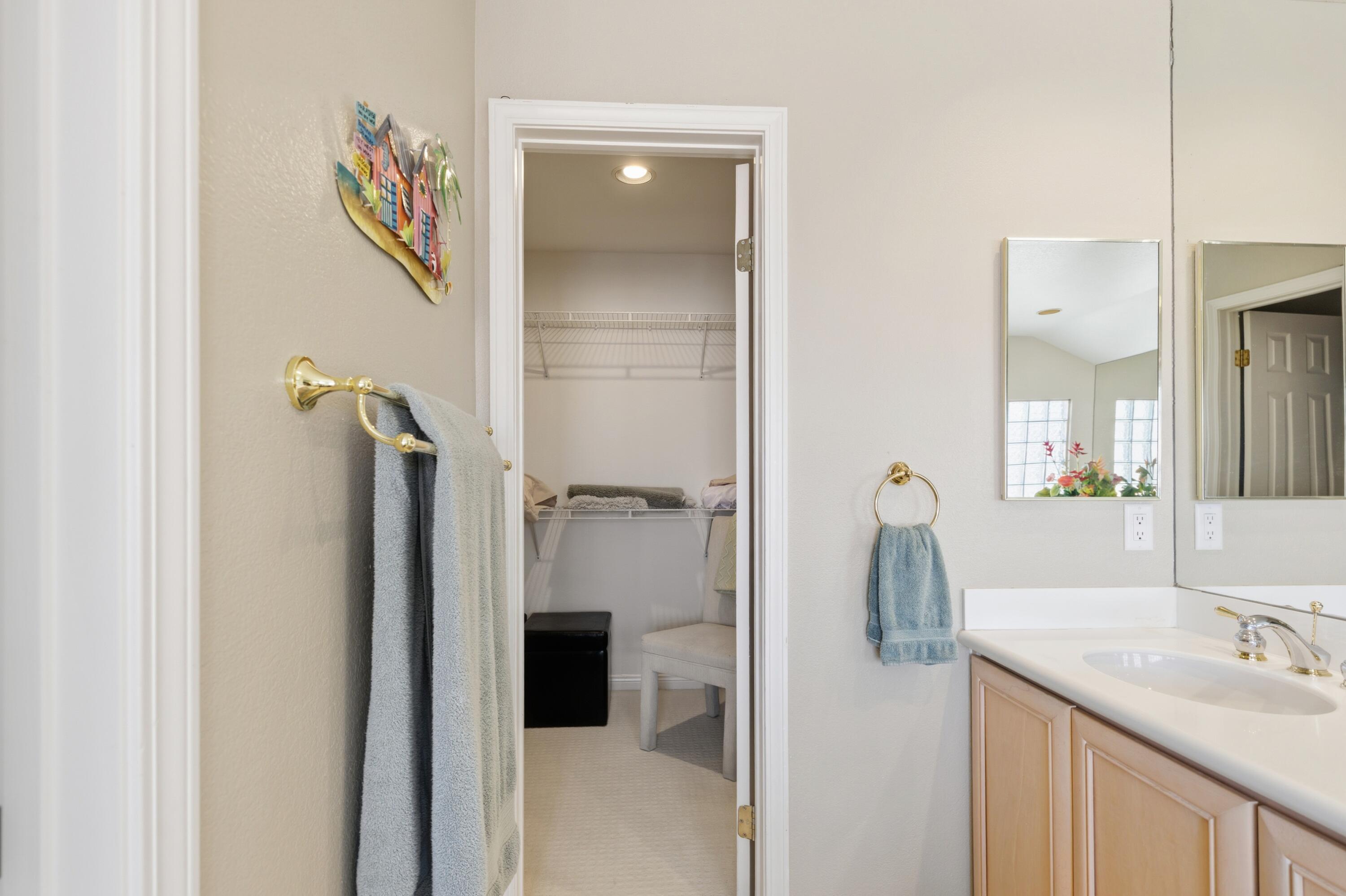 39 Augusta Drive Rancho Mirage, CA 92270 - Photo 40 of 53 a bathroom with a sink and mirror