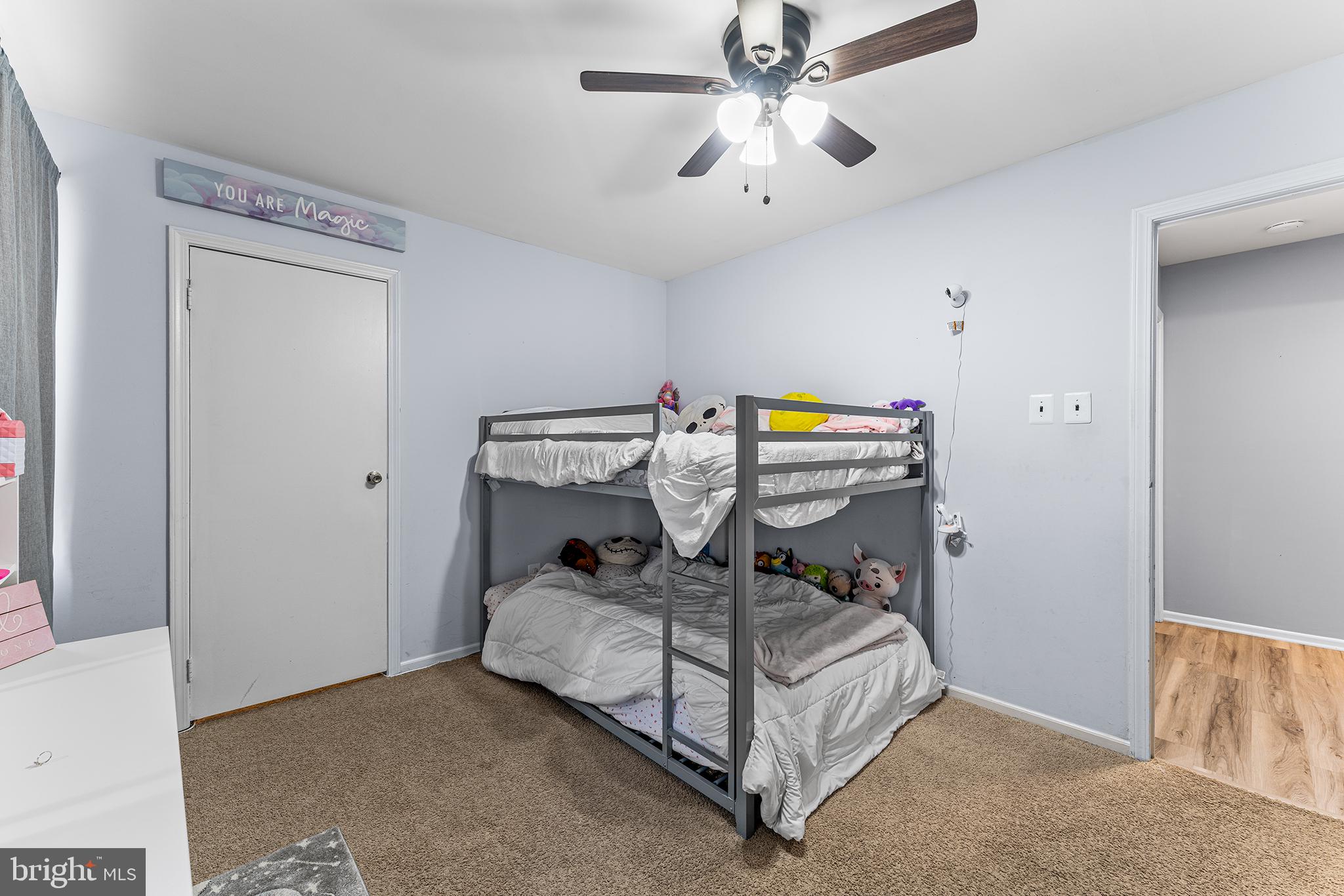 16 Devon Place Sewell, NJ 08080 - Photo 19 of 22 a bedroom with a bed and a chandelier