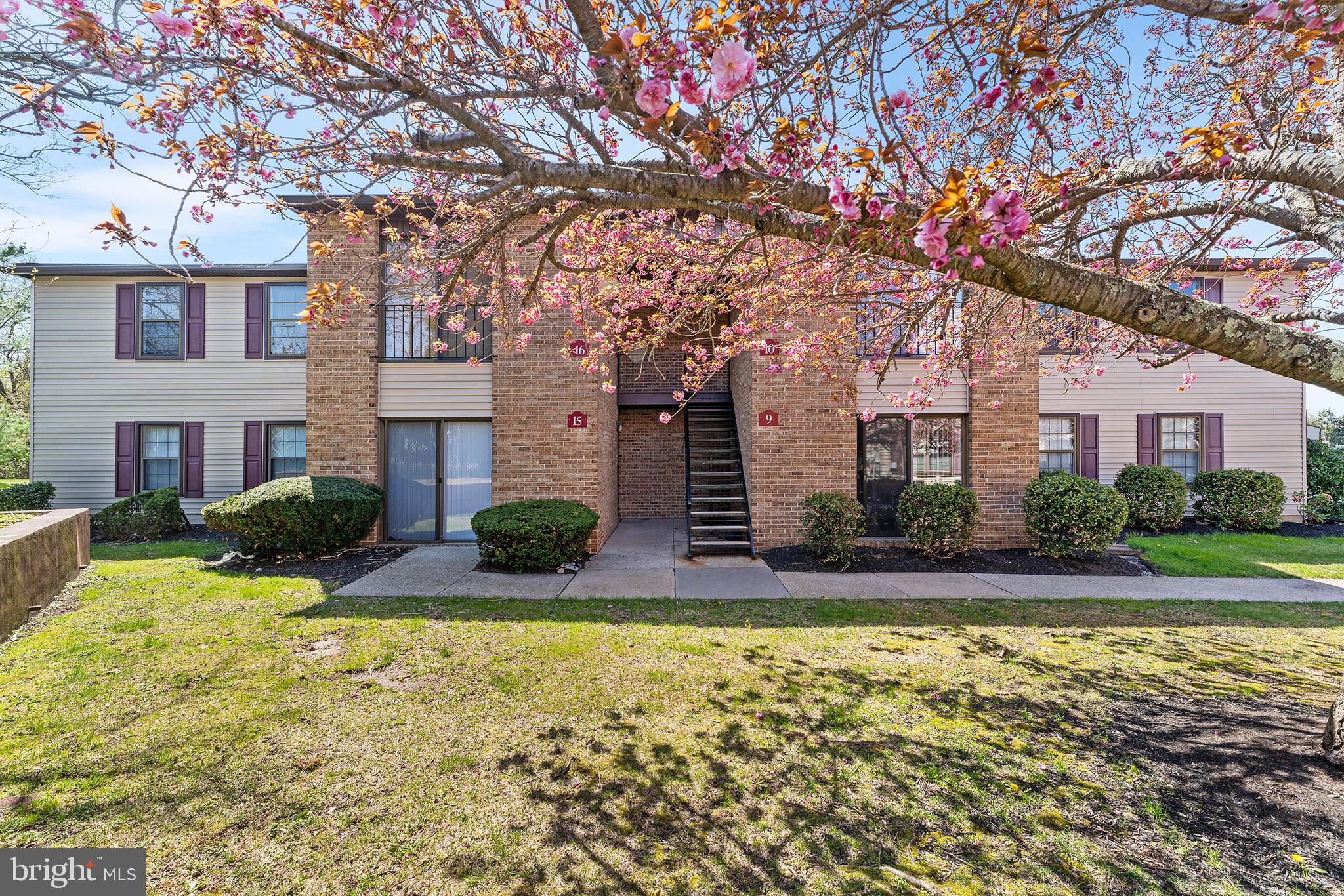 16 Devon Place Sewell, NJ 08080 - Photo 2 of 22 a front view of a house with swimming pool