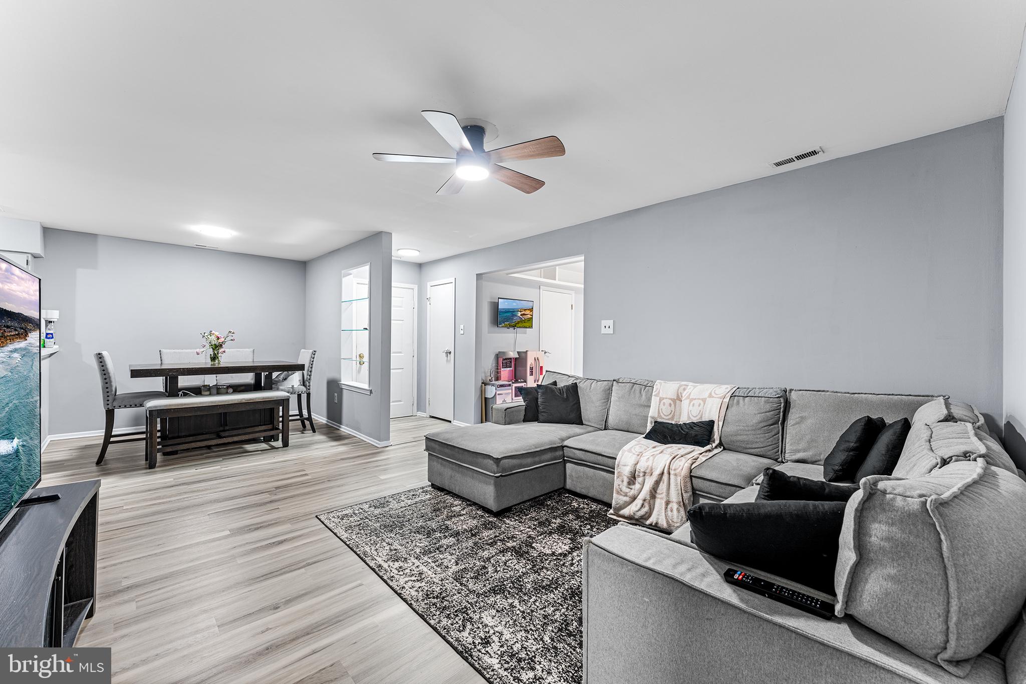 16 Devon Place Sewell, NJ 08080 - Photo 5 of 22 a living room with furniture and wooden floor