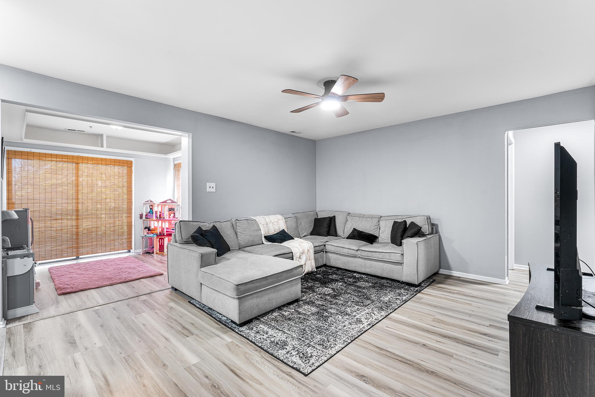 16 Devon Place Sewell, NJ 08080 - Photo 6 of 22 a living room with furniture and a flat screen tv