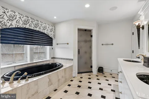 a bathroom with a sink and a bathtub