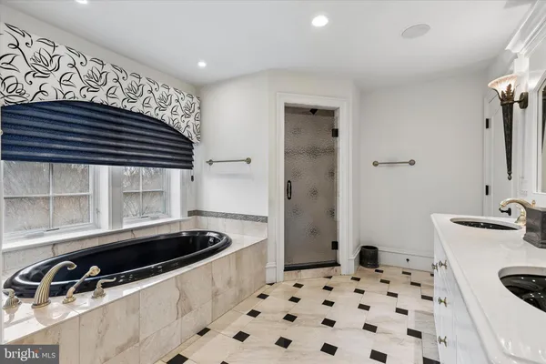 a bathroom with a sink and a bathtub