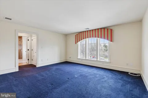 an empty room with a door