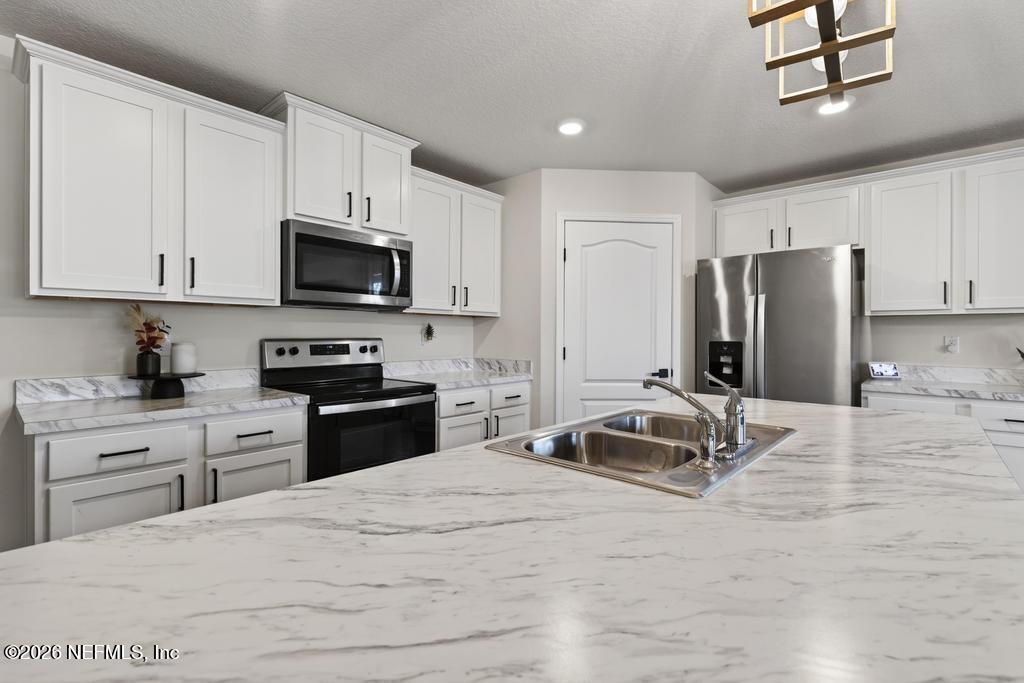 70155 Roseapple Court Yulee, FL 32097 - Photo 7 of 38 70155 Roseapple Ct-35