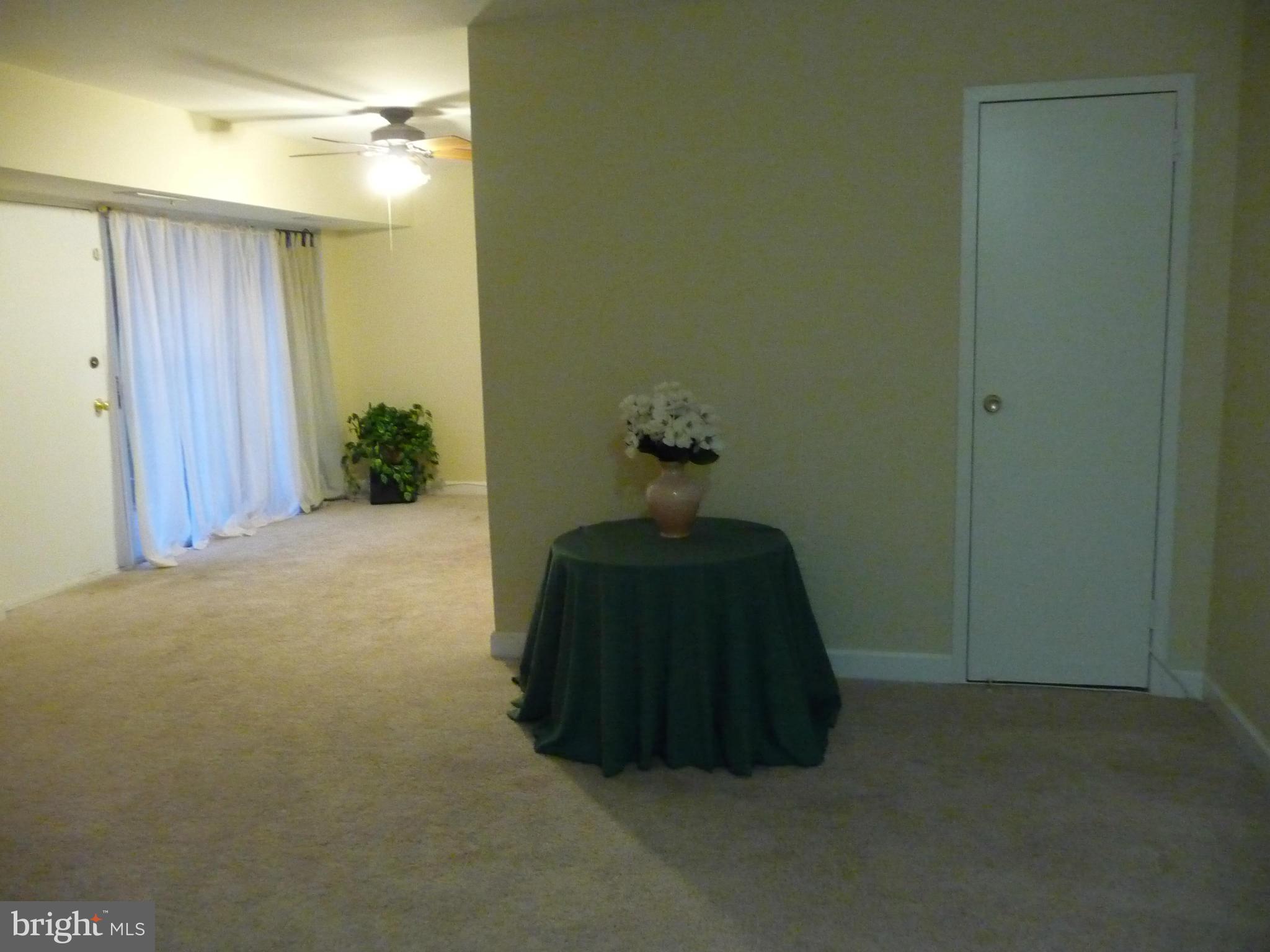 3820 Bel Pre Road, Unit 272 Silver Spring, MD 20906 - Photo 2 of 27 Living Room with Coat Closet