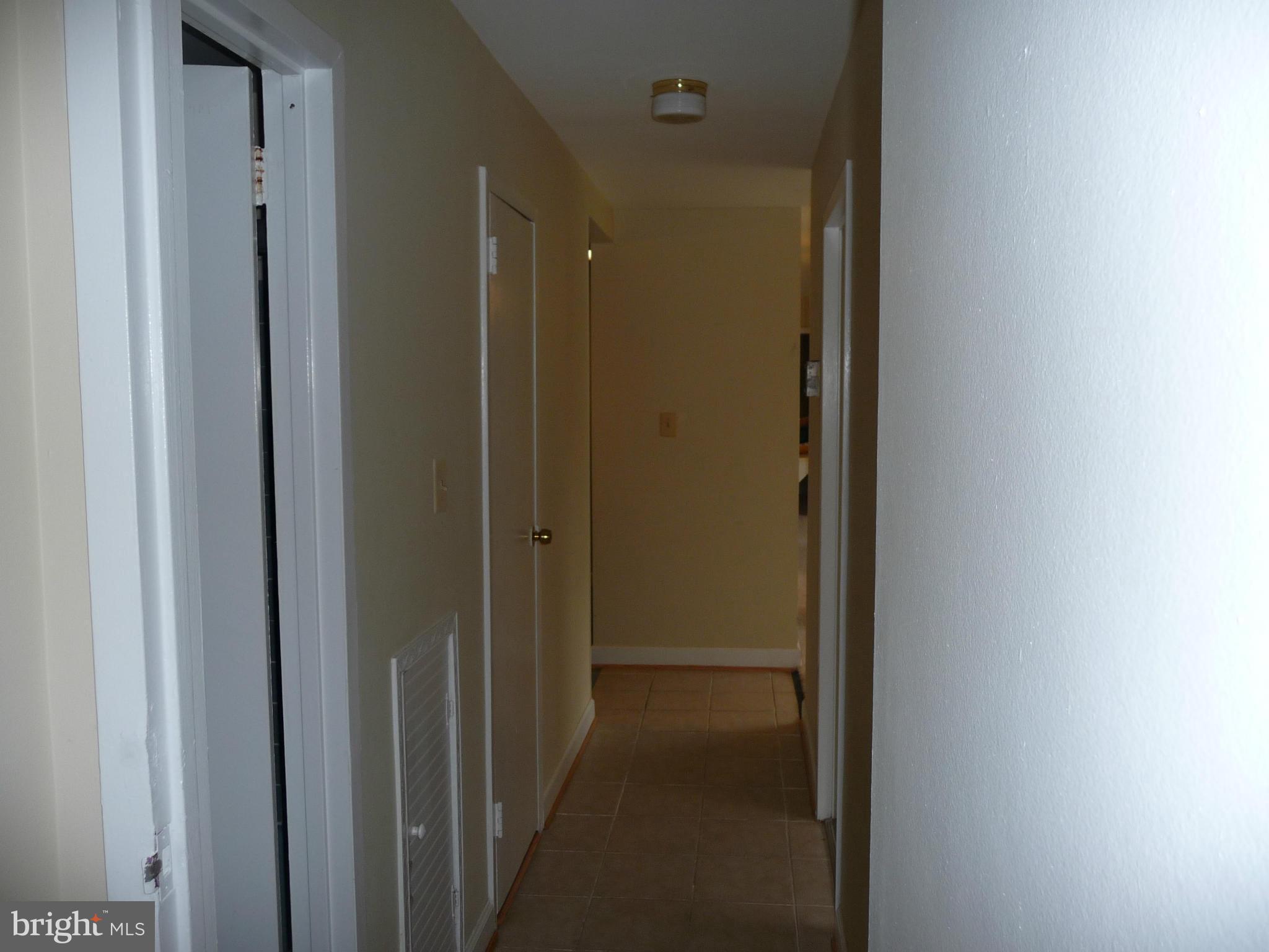 3820 Bel Pre Road, Unit 272 Silver Spring, MD 20906 - Photo 15 of 27 Connecting Hallway to Bedrooms