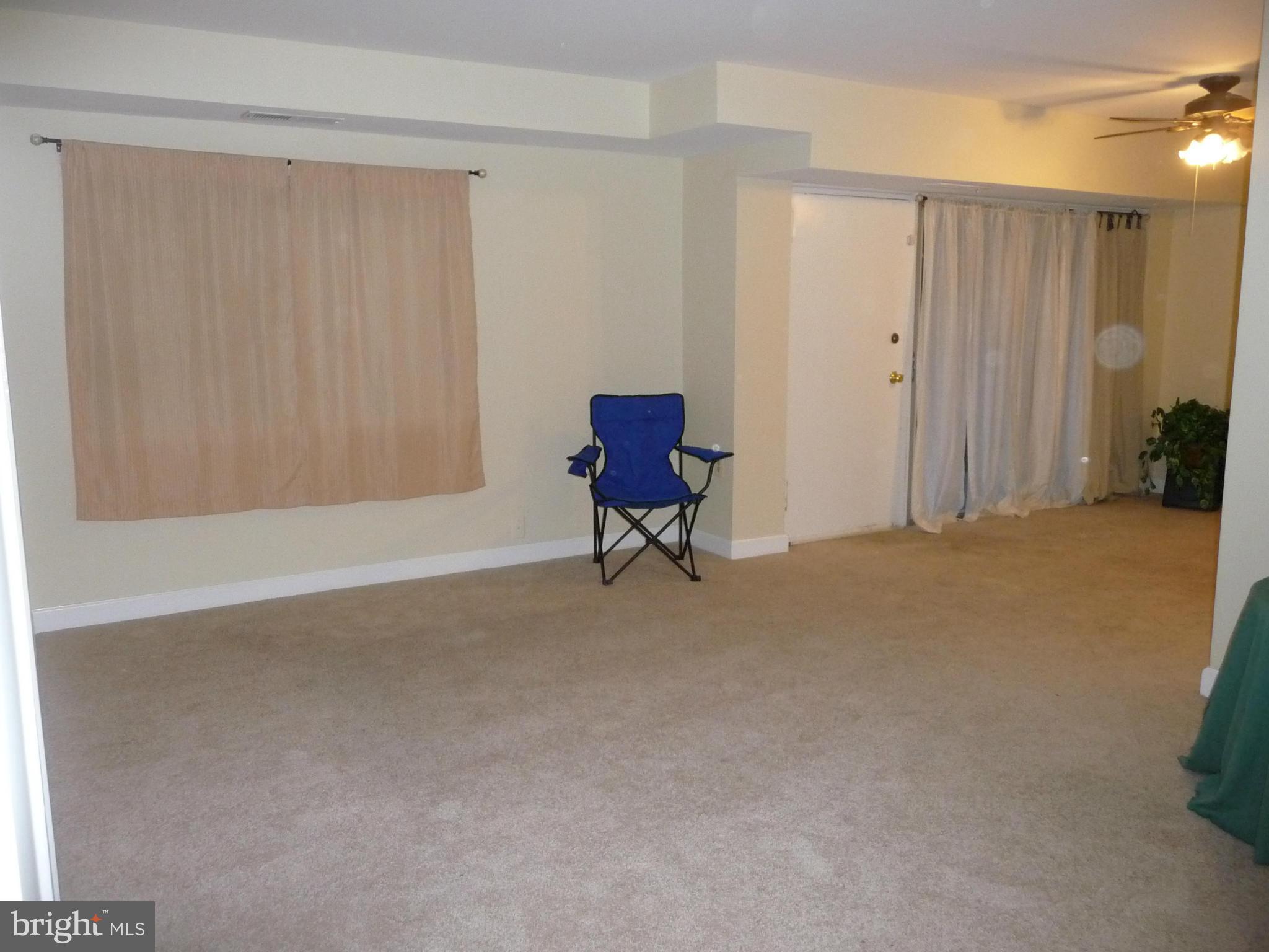 3820 Bel Pre Road, Unit 272 Silver Spring, MD 20906 - Photo 4 of 27 Wall-to-wall Carpeted Living Room