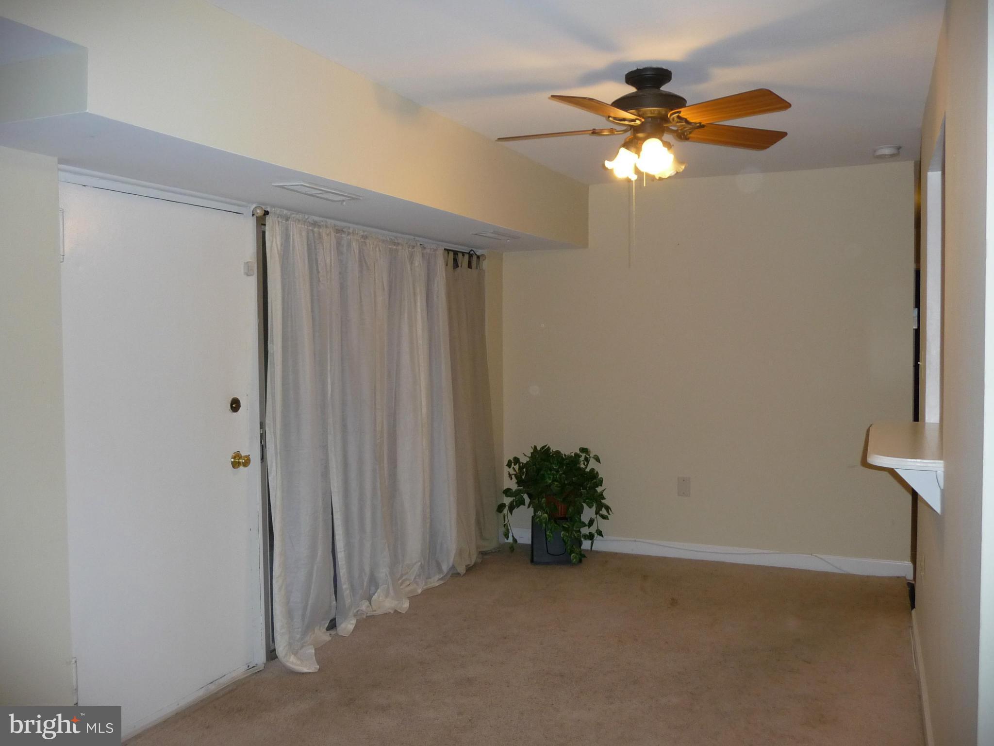 3820 Bel Pre Road, Unit 272 Silver Spring, MD 20906 - Photo 5 of 27 Dining Room with Exterior Door to Yard