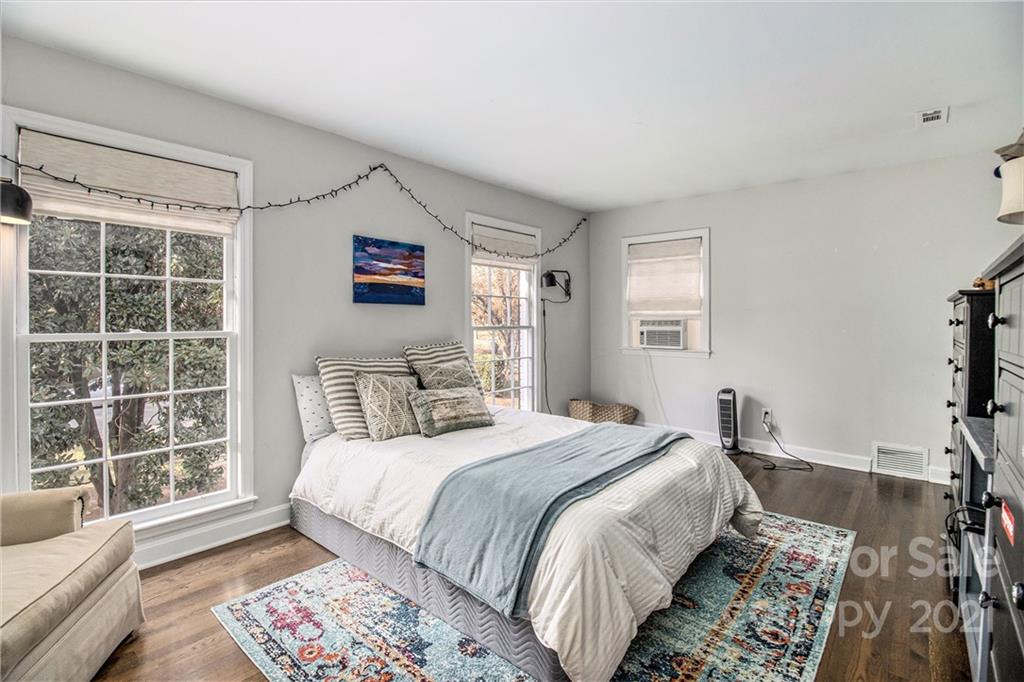 3513 Highview Road Charlotte, NC 28210 - Photo 18 of 27 a bedroom with a bed and a window