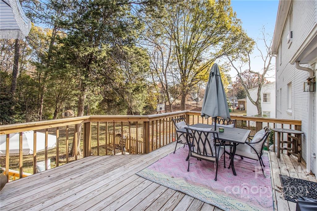 3513 Highview Road Charlotte, NC 28210 - Photo 23 of 27 a view of a deck with furniture and wooden floor