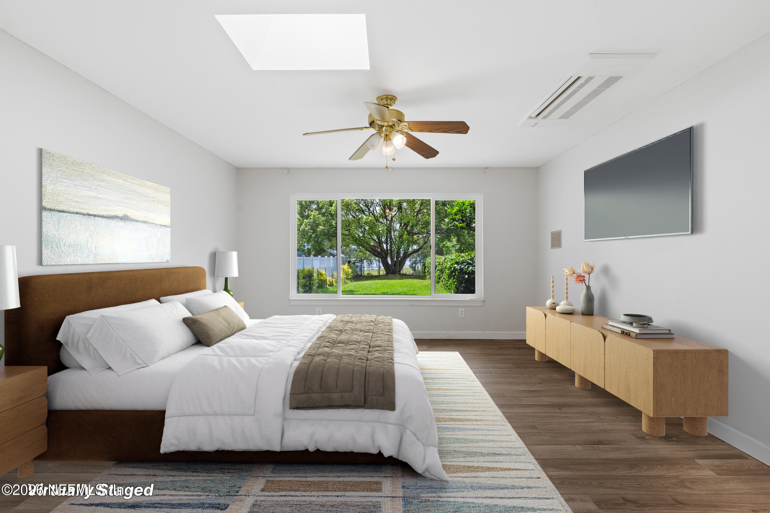 49 Nelsons Point Keystone Heights, FL 32656 - Photo 24 of 39 a bed room with bed and a chandelier