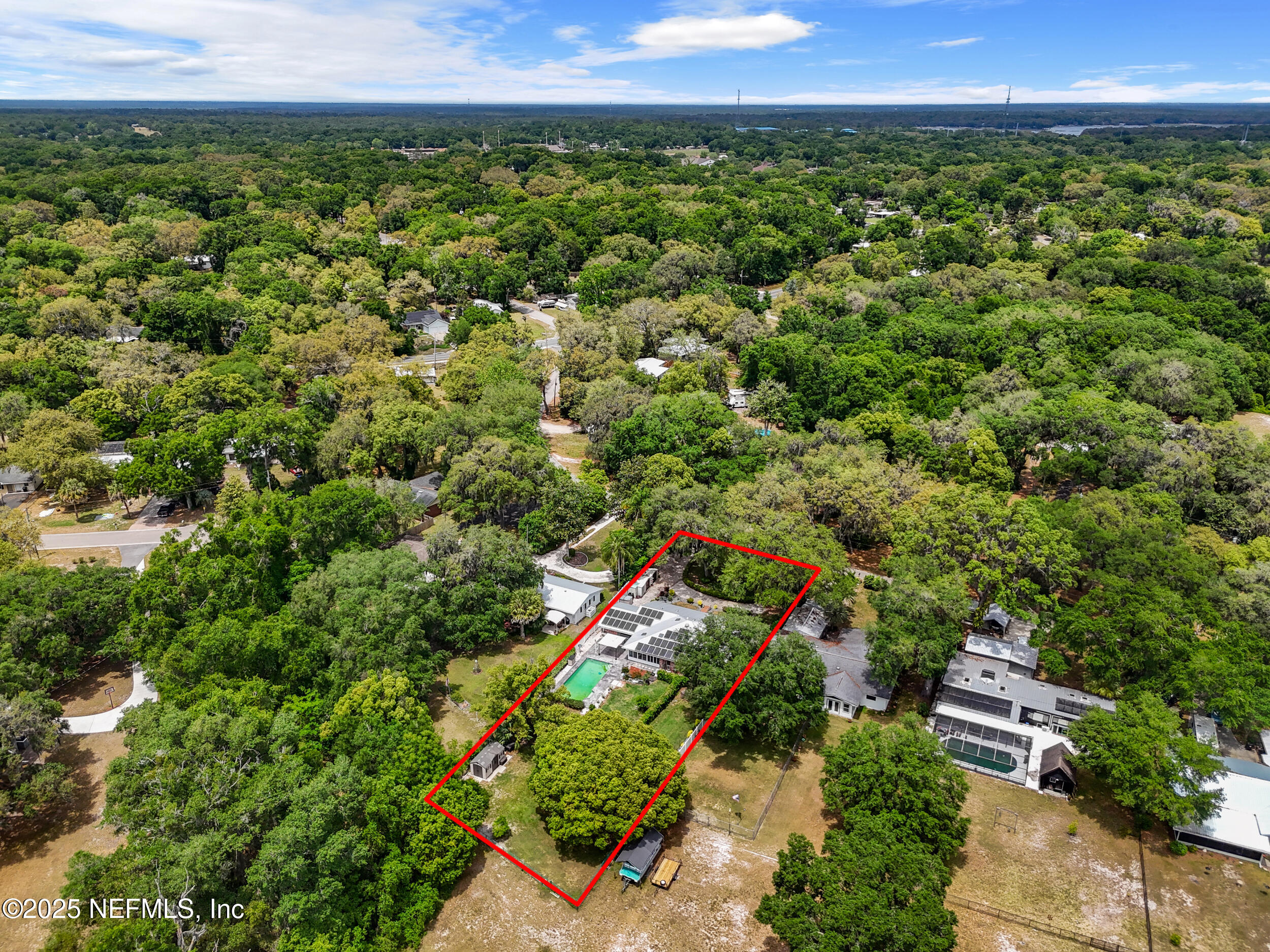 49 Nelsons Point Keystone Heights, FL 32656 - Photo 38 of 39 an aerial view of a city with lots of residential buildings