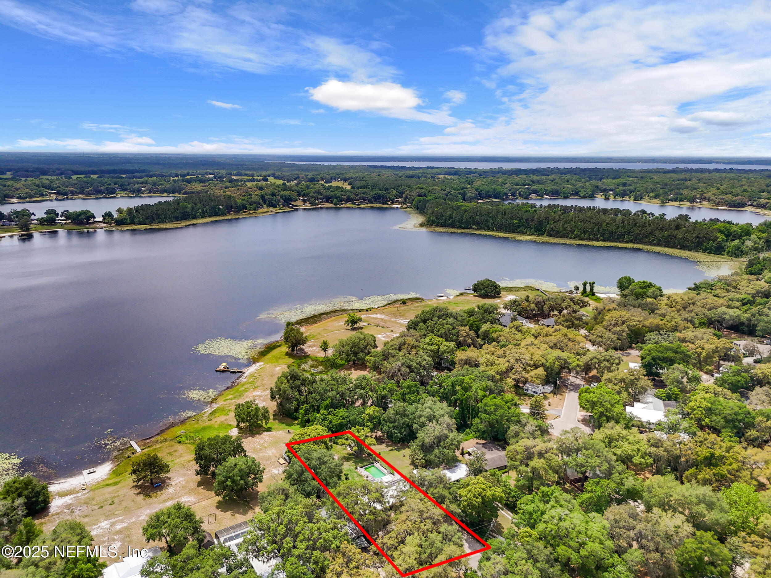49 Nelsons Point Keystone Heights, FL 32656 - Photo 39 of 39 a view of a lake with a city