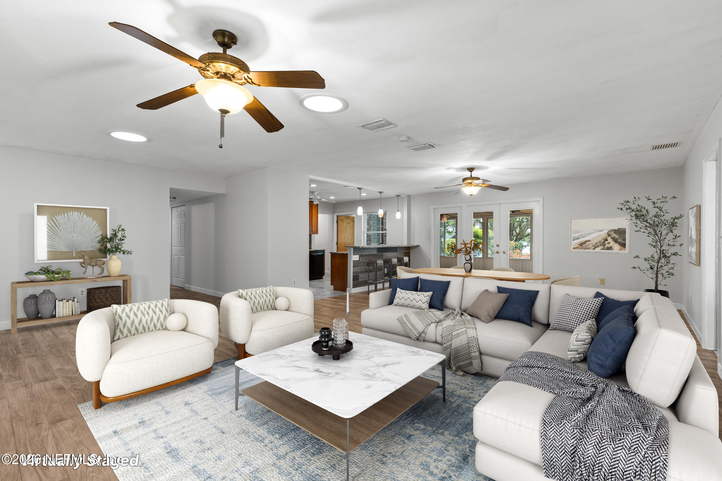 49 Nelsons Point Keystone Heights, FL 32656 - Photo 10 of 39 a living room with furniture kitchen view and a large window