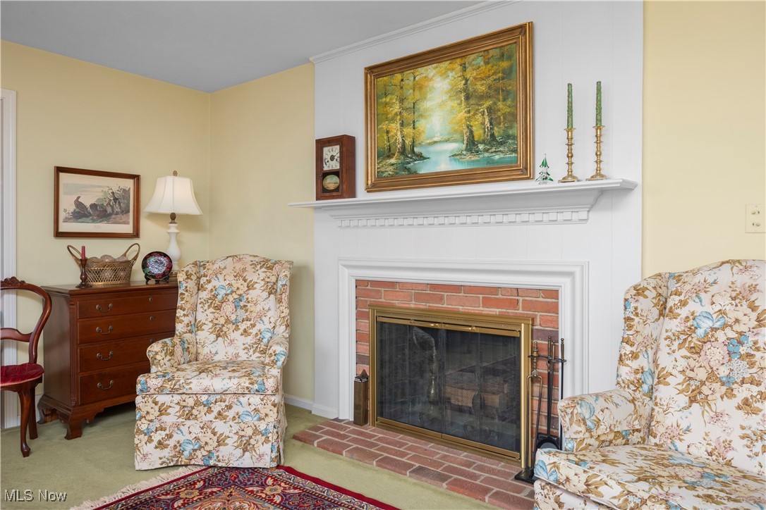 26907 Lake Road Bay Village, OH 44140 - Photo 10 of 33 Cozy up to this lovely brick fireplace on a cold night! The perfect place to read a good book.