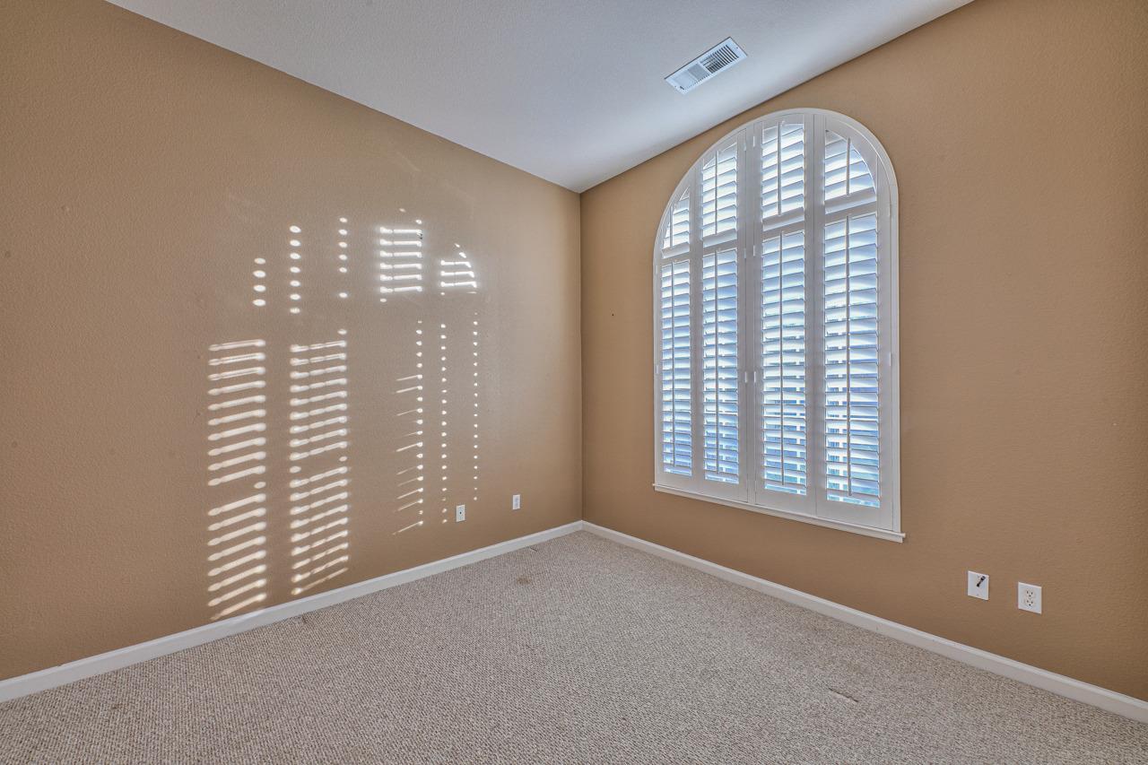 20 Glen Falls Circle Salinas, CA 93906 - Photo 27 of 37 a view of an empty room with a window