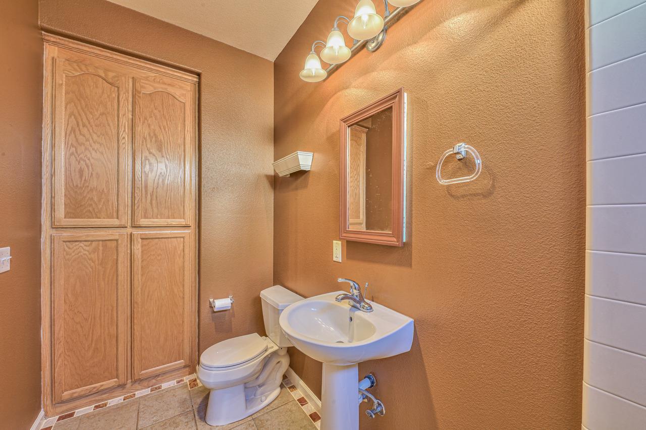 20 Glen Falls Circle Salinas, CA 93906 - Photo 29 of 37 a bathroom with a sink toilet and shower