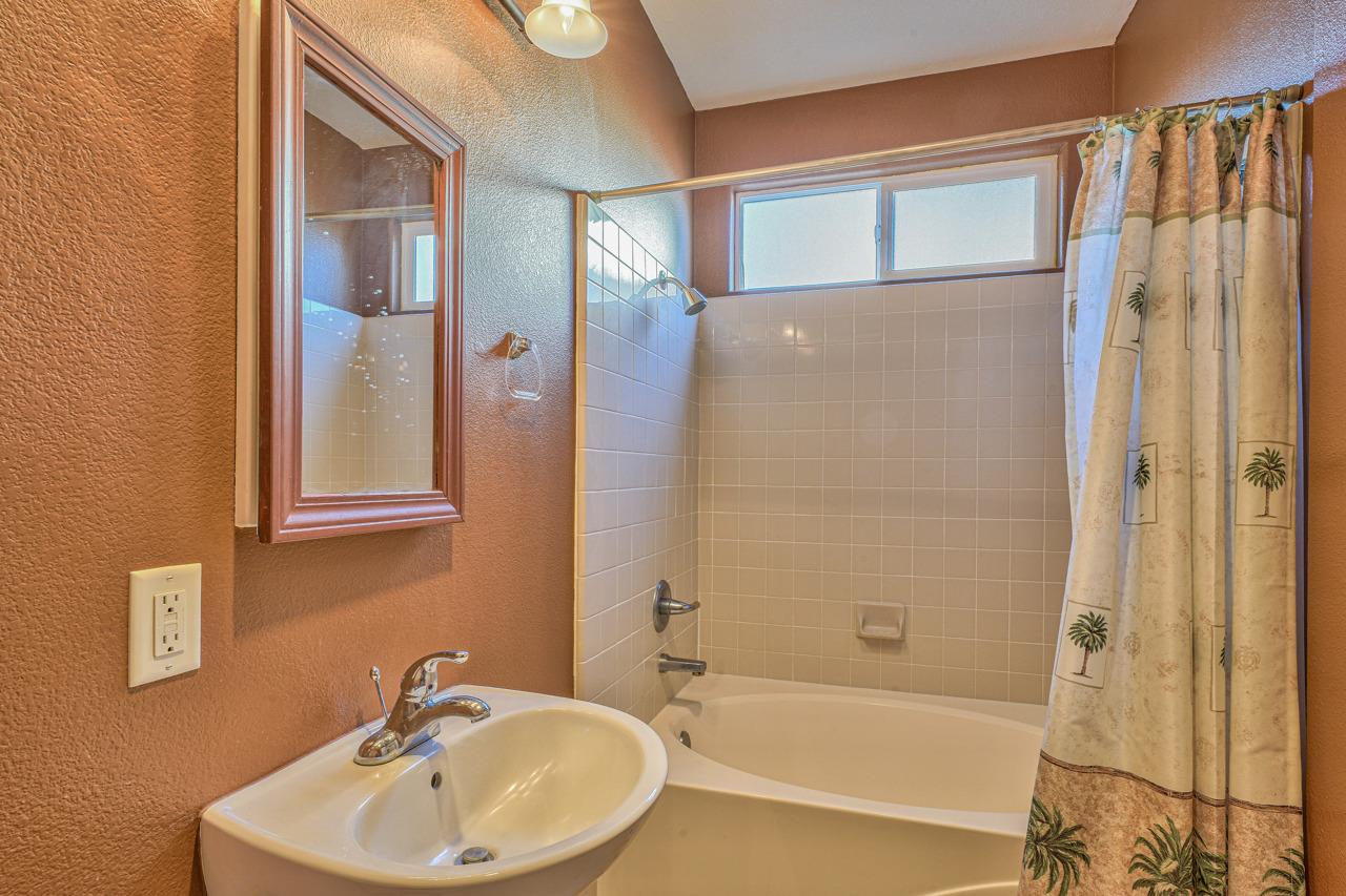 20 Glen Falls Circle Salinas, CA 93906 - Photo 30 of 37 a bathroom with a sink and a bathtub