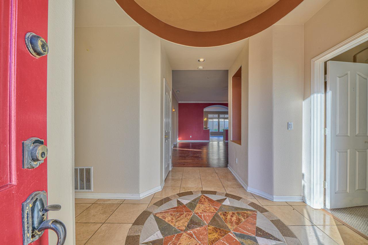 20 Glen Falls Circle Salinas, CA 93906 - Photo 3 of 37 a view of a hallway to a livingroom with furniture