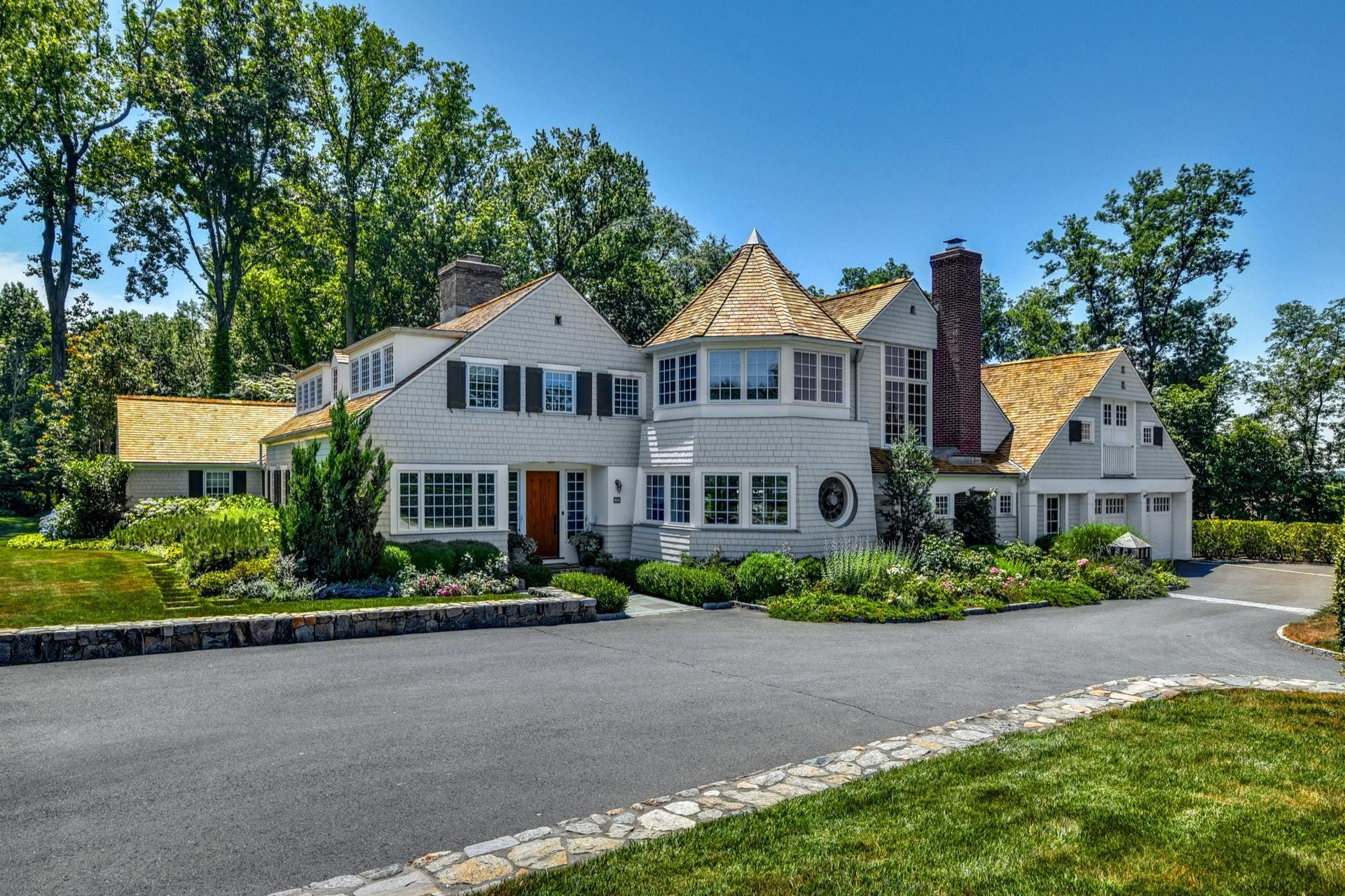 100 Long Neck Point Road Darien, CT 06820 - Photo 2 of 2 front view of a house with a street