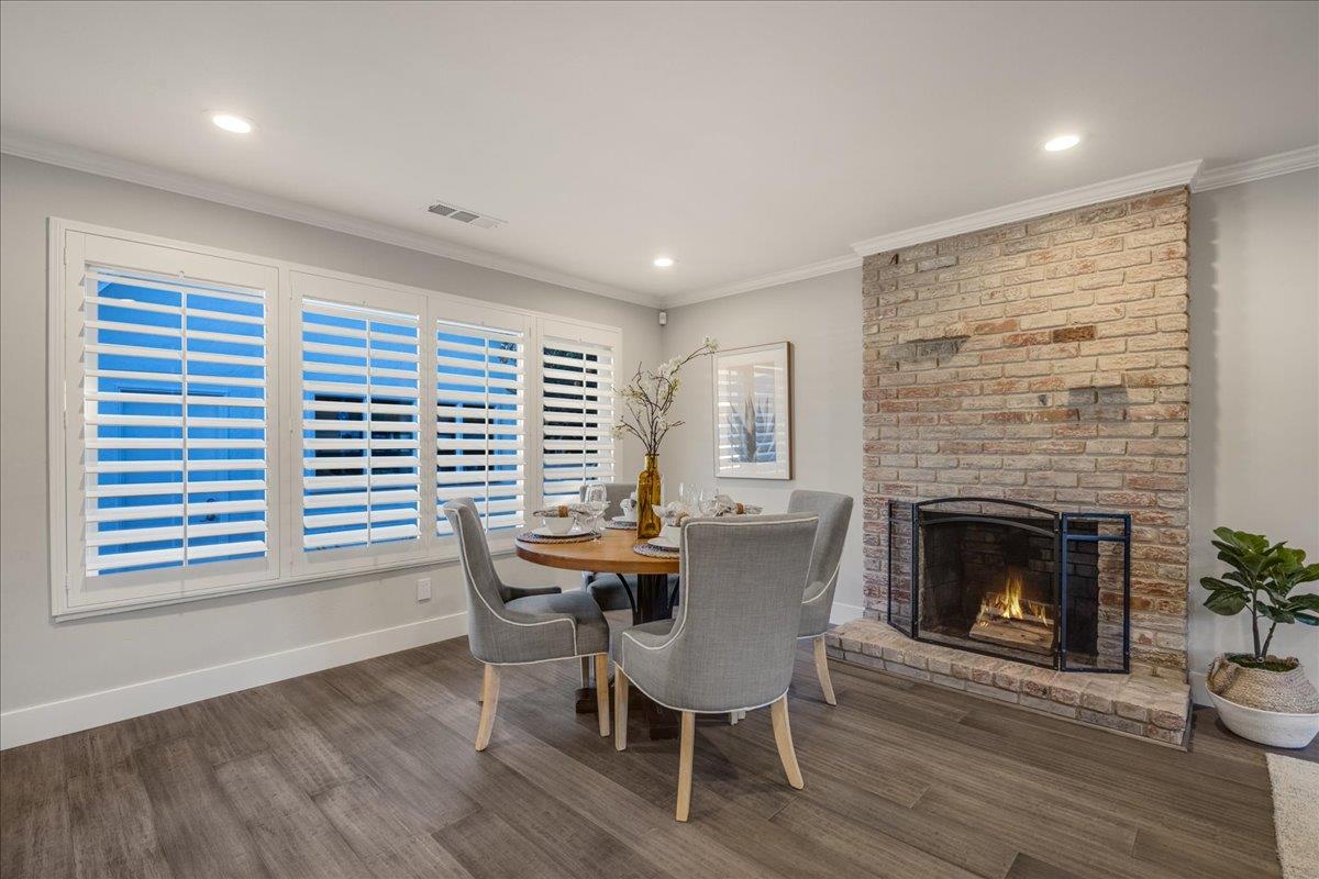 1450 Padres Drive San Jose, CA 95125 - Photo 13 of 52 a dining room with furniture and a fireplace