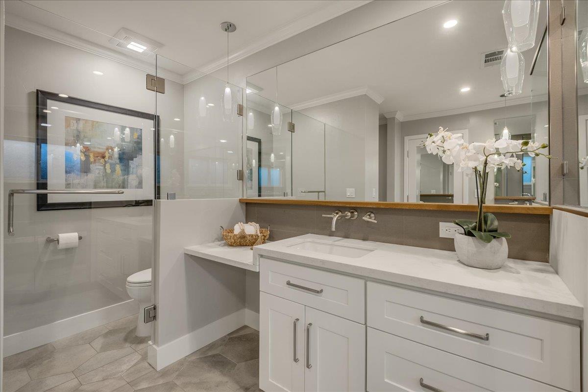 1450 Padres Drive San Jose, CA 95125 - Photo 23 of 52 a bathroom with a double vanity sink and a mirror