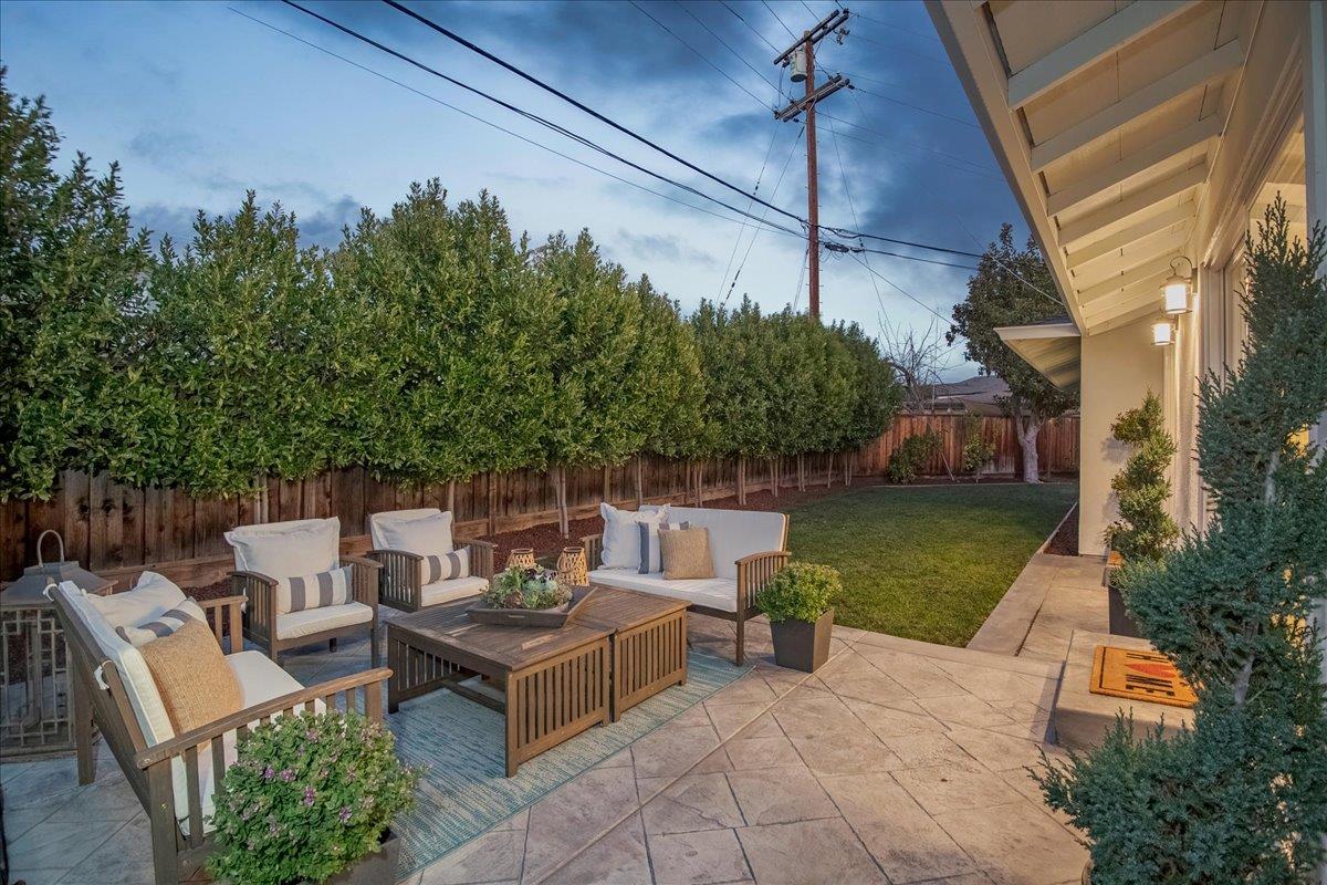 1450 Padres Drive San Jose, CA 95125 - Photo 31 of 52 a view of a patio with table and chairs potted plants with wooden fence