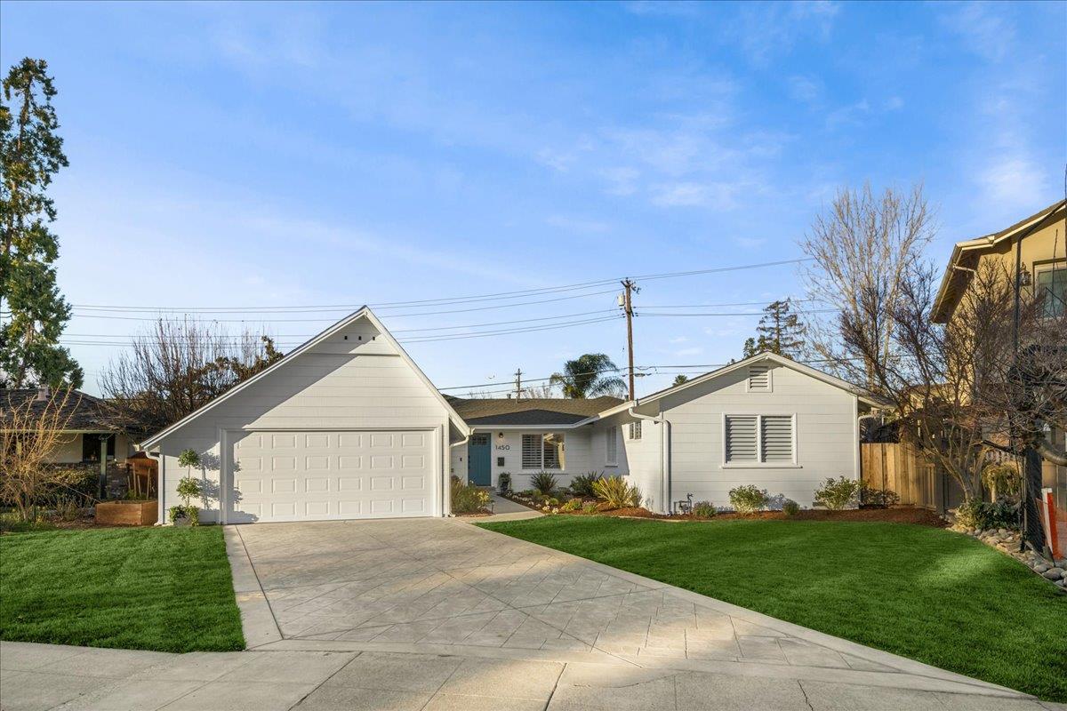 1450 Padres Drive San Jose, CA 95125 - Photo 5 of 52 a view of a white house next to a yard with big trees