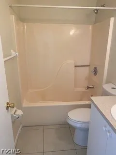 a bathroom with a toilet a sink and bathtub