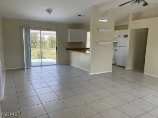a view of a kitchen with a sink