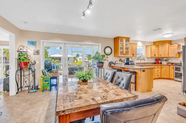 a living room with furniture and flat screen tv