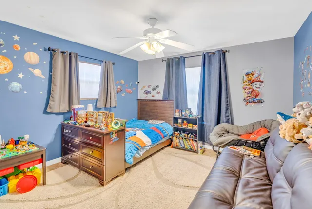 a living room with furniture and a couch