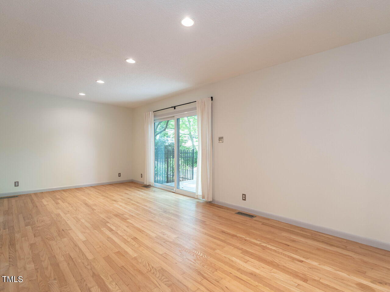 2204 Myron Drive Raleigh, NC 27607 - Photo 11 of 57 This room makes for a wonderful dining / flex / gathering room with easy access to Trex side deck.