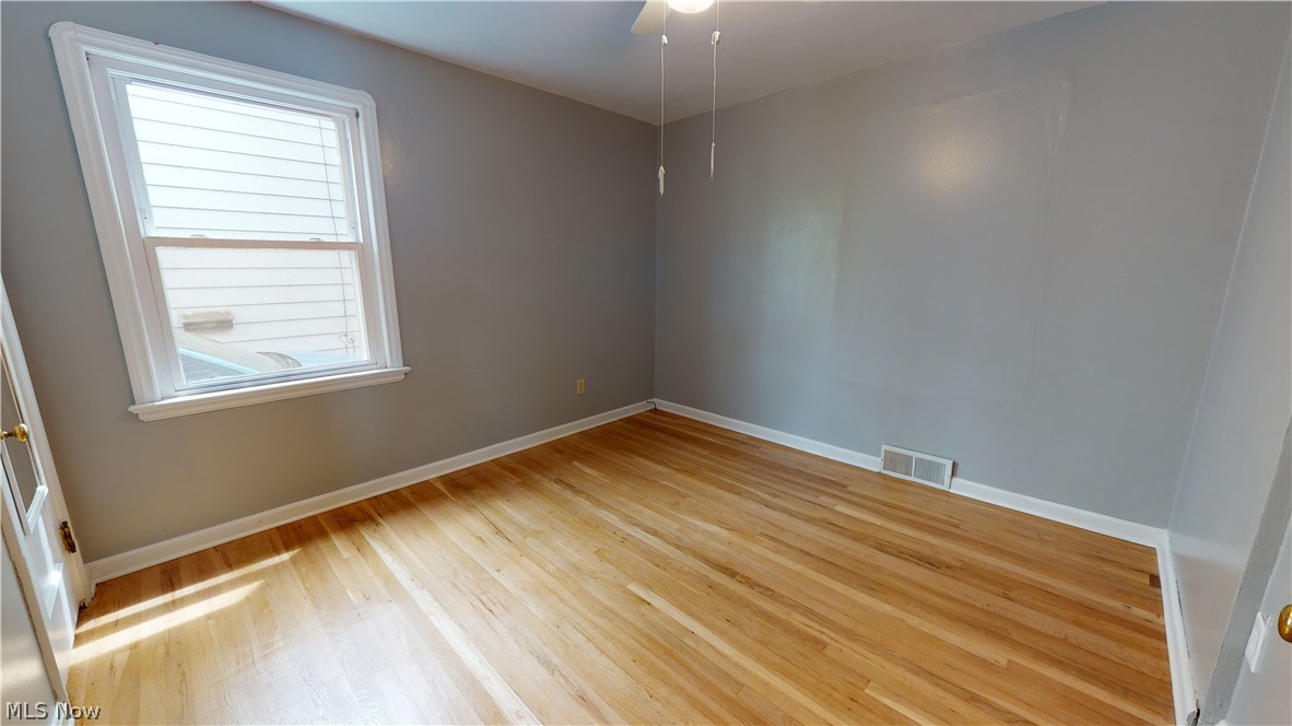 1600 Brainard Road Lyndhurst, OH 44124 - Photo 10 of 27 First floor bedroom, with gorgeous hardwood floors and fresh, modern paint!