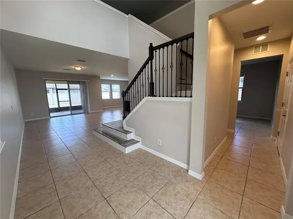 a view of a hallway with entryway