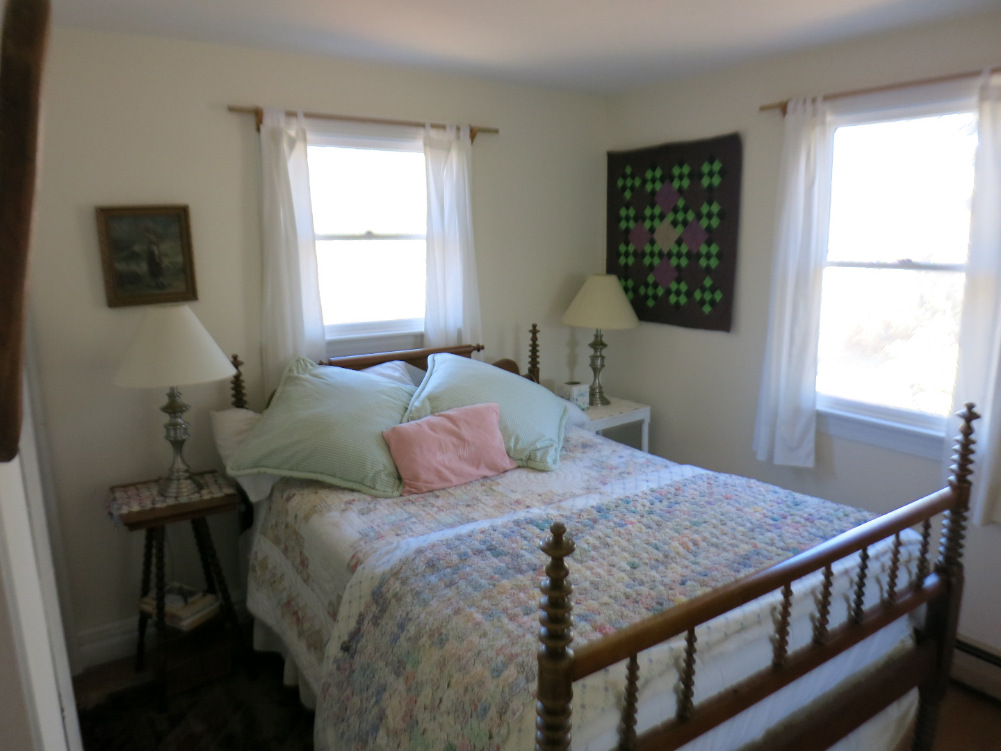 86 Marthas Road Edgartown, MA 02539 - Photo 16 of 25 a bedroom with a bed window and a table