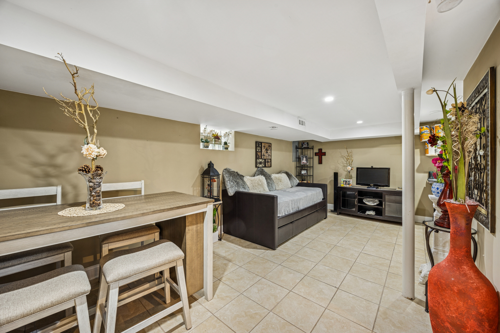 7535 West 63rd Place Summit, IL 60501 - Photo 12 of 19 a living room with furniture a dining table and a fireplace