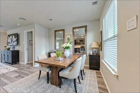 a view of a dining room with furniture