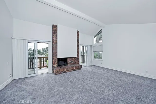 a view of a livingroom with furniture