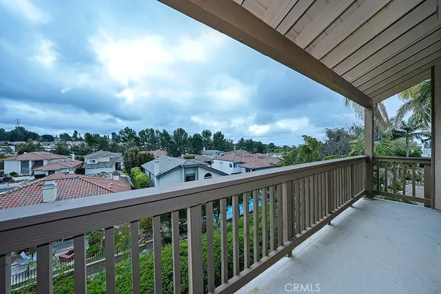 a view of a balcony with city view
