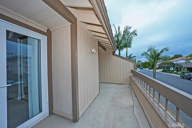 a view of balcony and potted plants