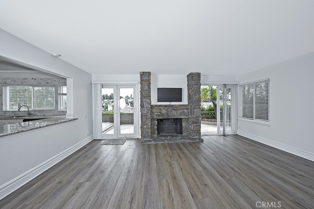 28312 Driza Mission Viejo, CA 92692 - Photo 6 of 21 a view of an empty room with wooden floor and a window