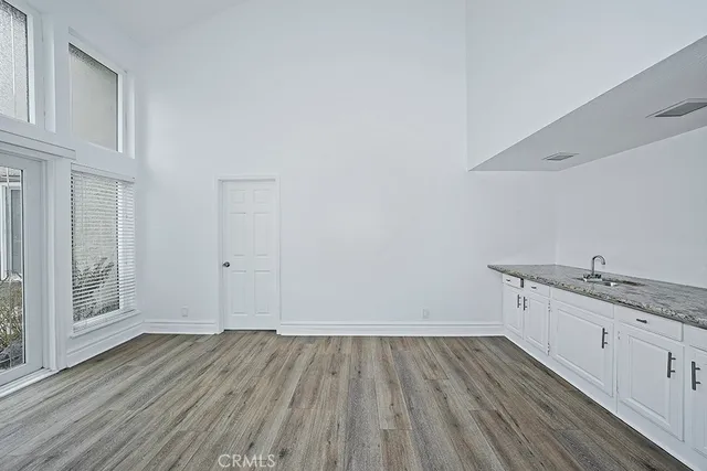 a view of a wooden floor and a sink