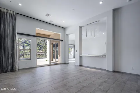 a kitchen with counter top space sink and stainless steel appliances