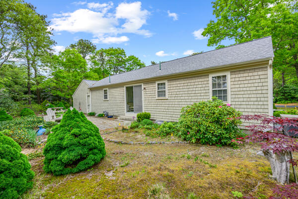 59 Beverly Road West Yarmouth, MA 02673 - Photo 7 of 33 a view of a house with a garden