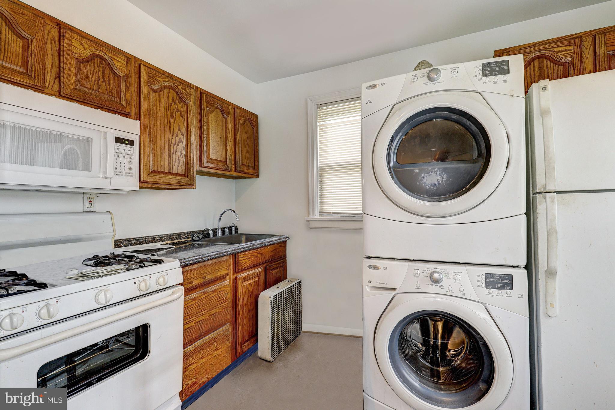 4527 Fairfax Road Baltimore, MD 21216 - Photo 8 of 17 Upper Level | Kitchen | Laundry