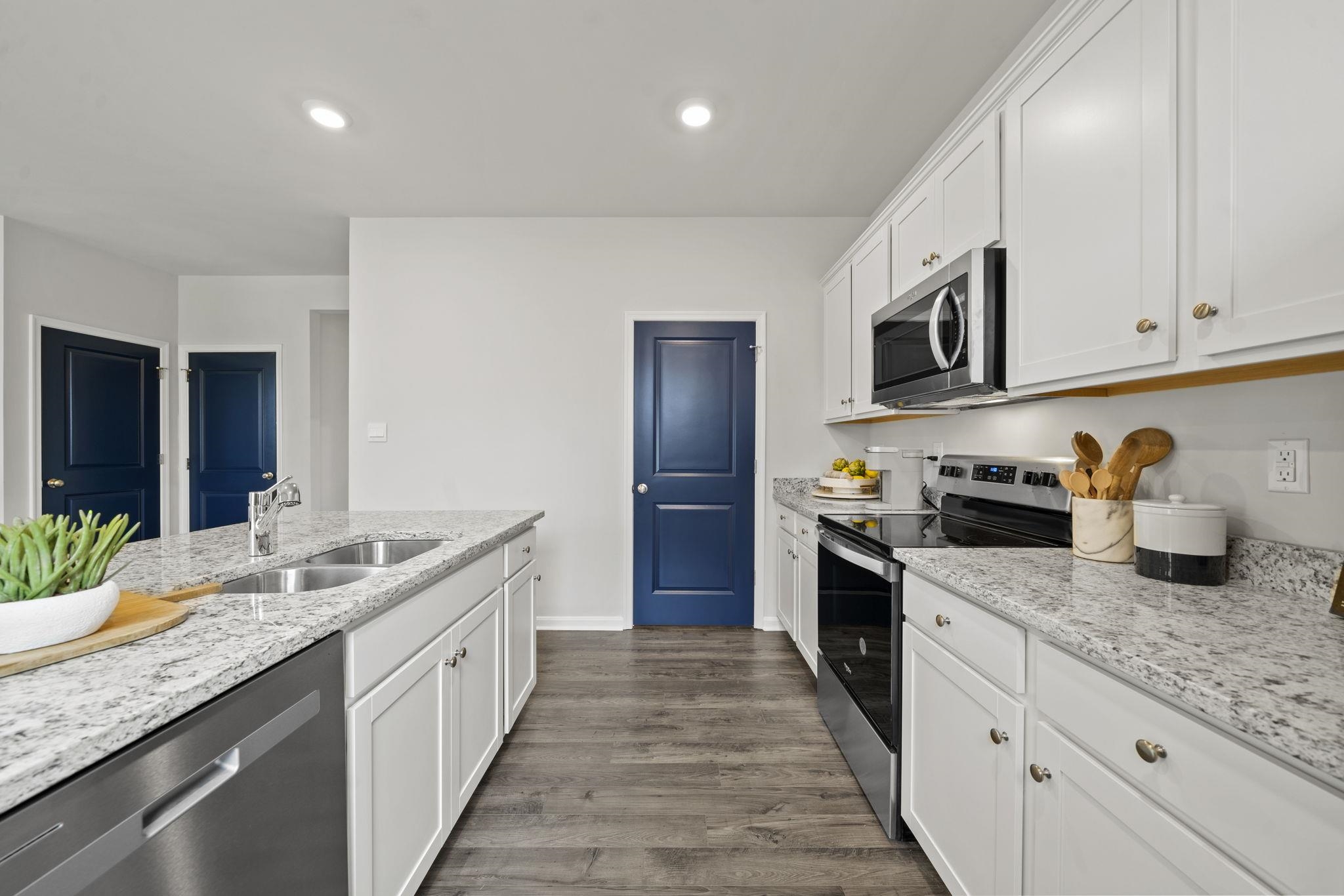 114 Rolling Rdg Court Staunton, VA 24401 - Photo 5 of 33 a large kitchen with granite countertop lots of counter space and stainless steel appliances