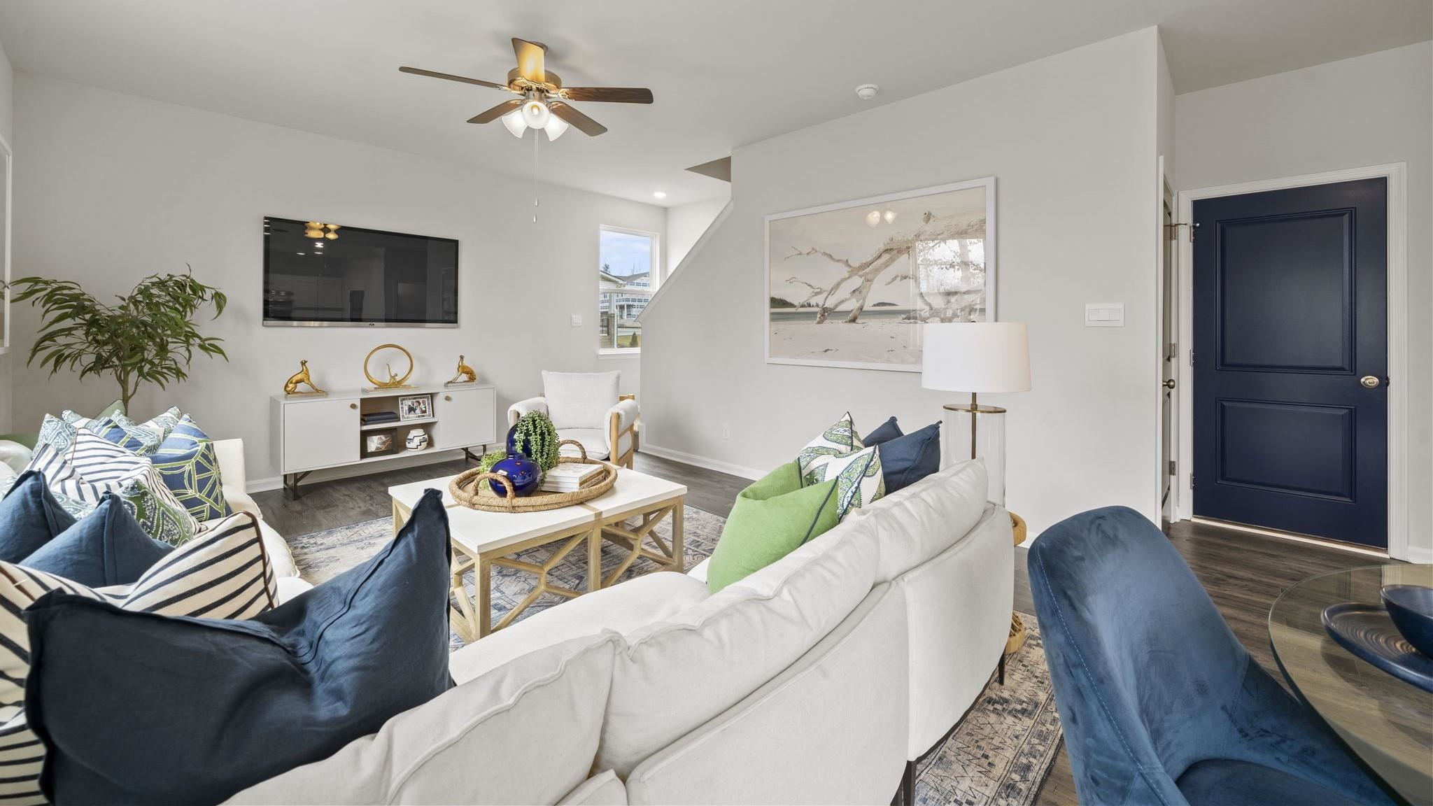 114 Rolling Rdg Court Staunton, VA 24401 - Photo 9 of 33 a living room with furniture a flat screen tv and a potted plant